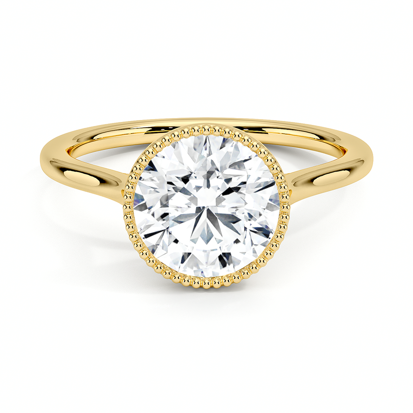 Anillo Eterno en tono oro amarillo con diamante redondo y marco fino